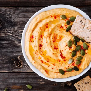 Creamy hummus dip served with olive oil